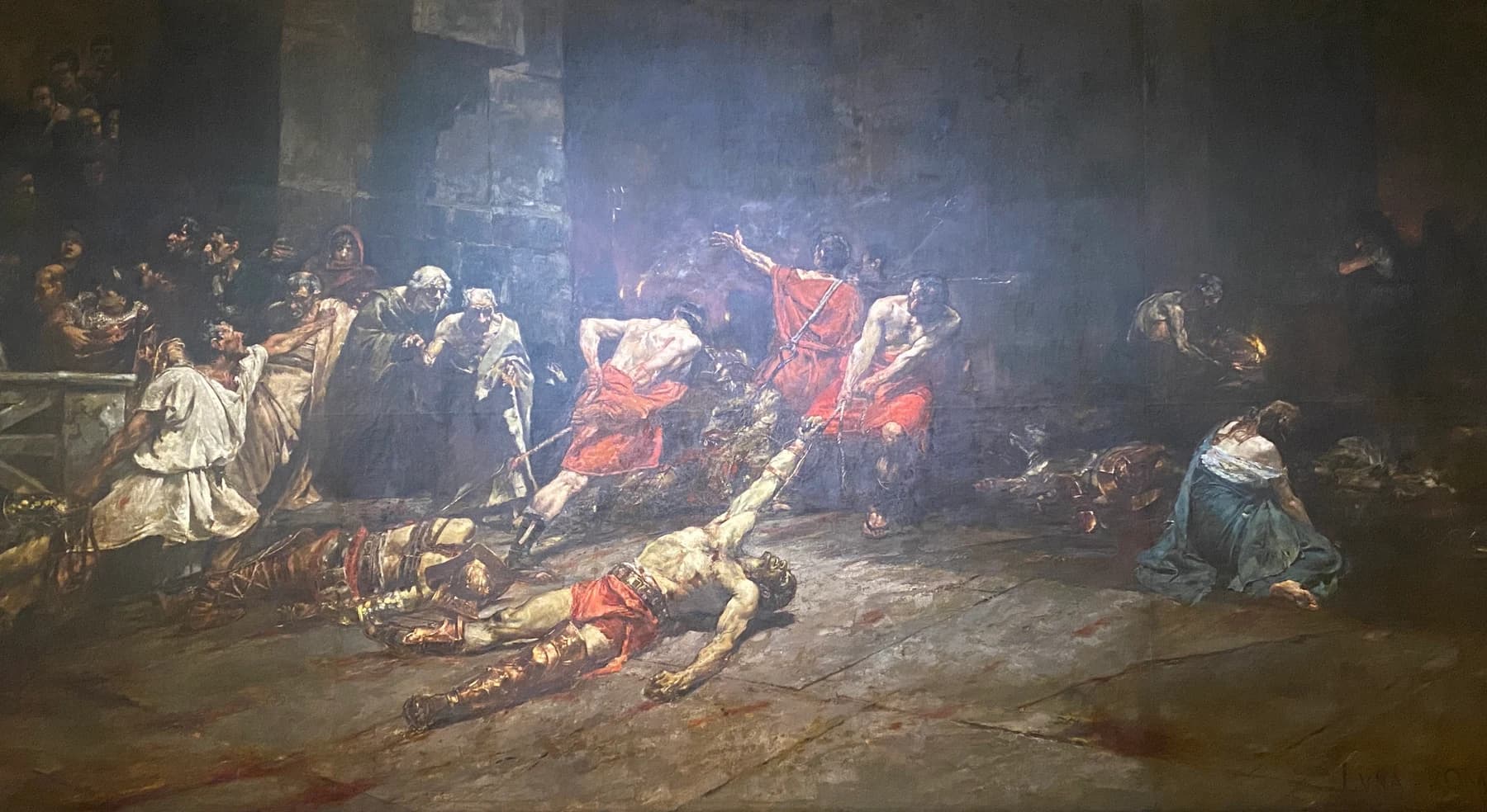 Photograph of a large painting showing figures in a dim interior.